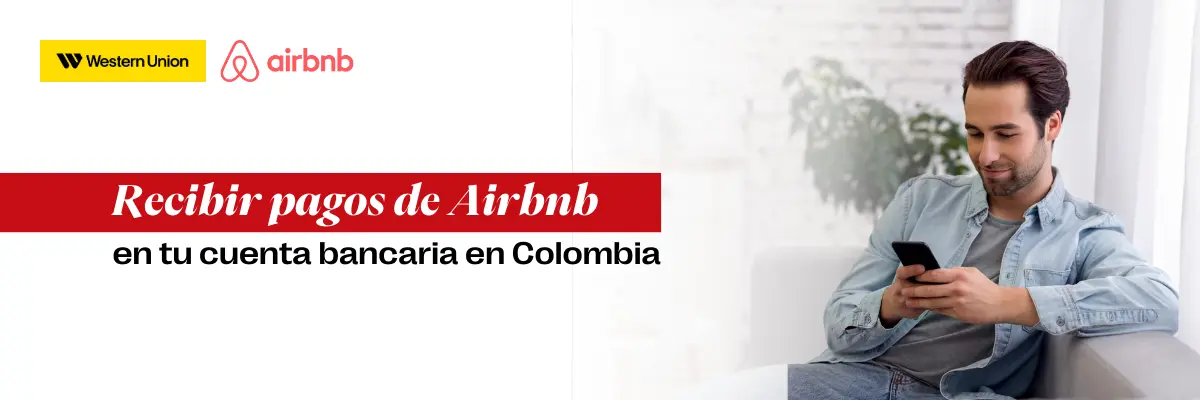 Persona usando su móvil para recibir pagos airbnb