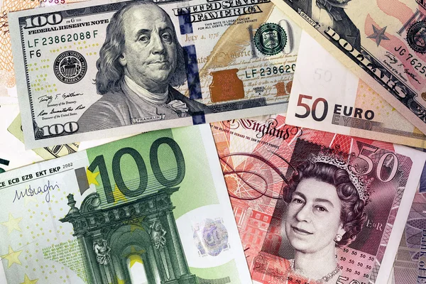 depositphotos 64003903 stock photo mix of currencies banknotes